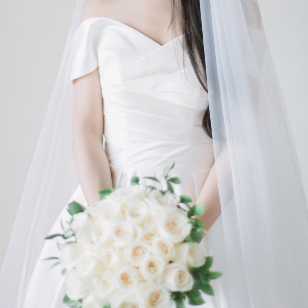 Elegant White Off-Shoulder Wedding Dress - Picture 2 of 5